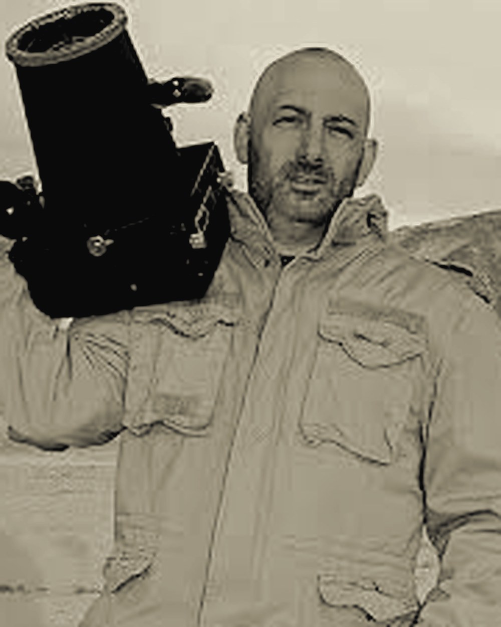 MARK Marinaccio in the field with a telescope rig.